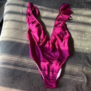 Purple one piece ruffle VS Pink bathing suit
